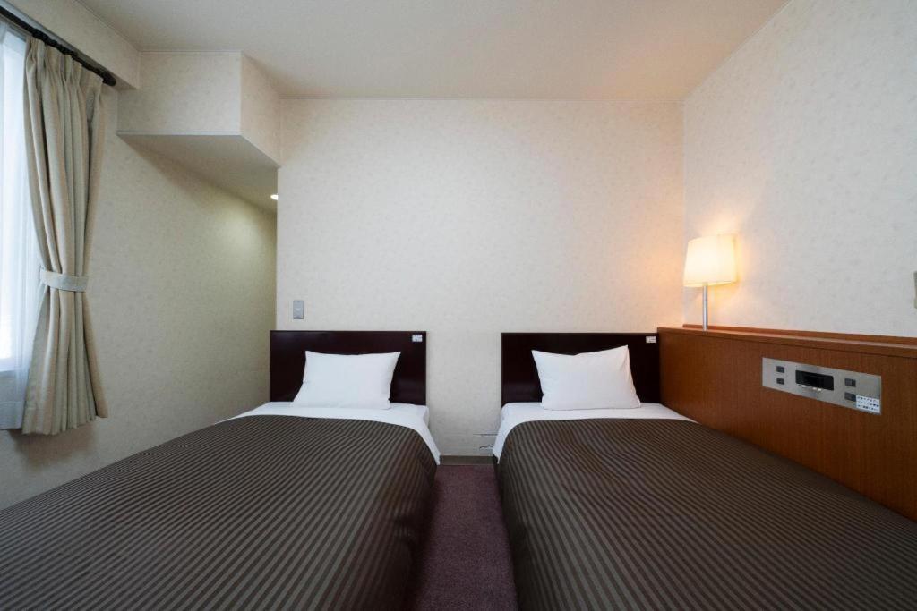 Royal Hotel Uohachi Tojota Kültér fotó